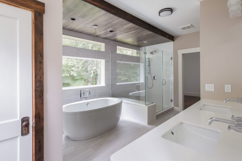 Contemporary Bathroom Remodel by Jensen Hus Design Build