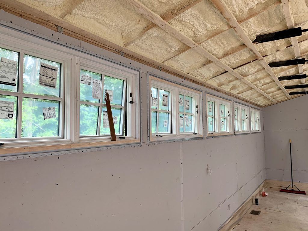 Windows, mouldings, and ceilings of renovated barn in Sherborn MA