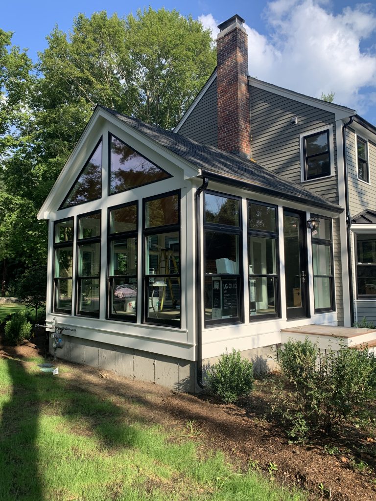 Contemporary Sunroom in Weston MA by Jensen Hus Design Build